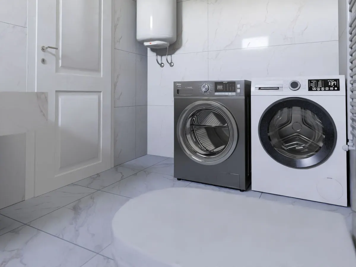 Two front-load laundry machines side by side in a modern utility room